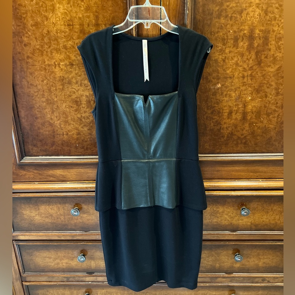 Bailey 44- Black peplum dress with  nylon, rayon